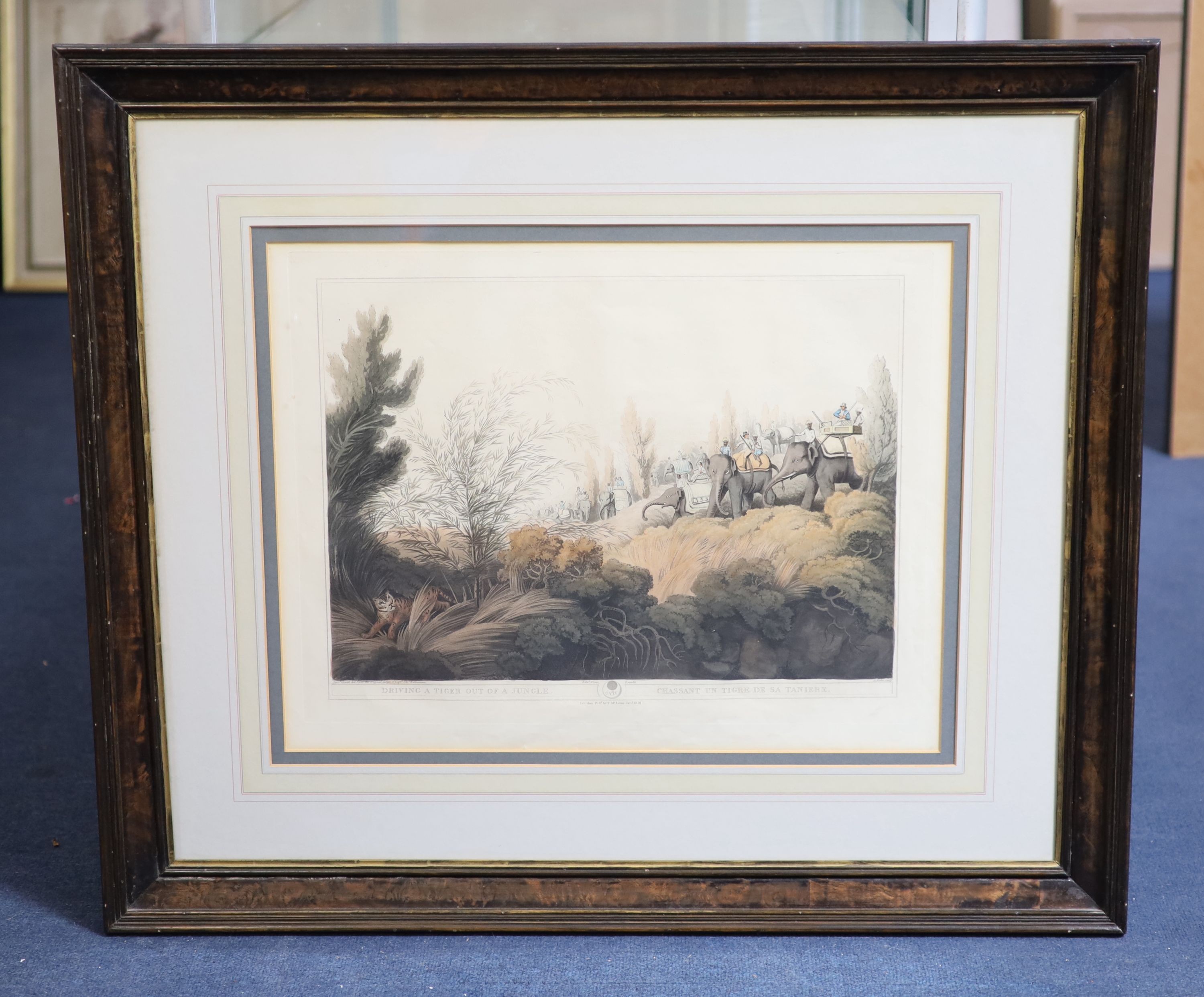 After Samuel Howett and Captain Thomas Williamson, Driving a tiger out of a jungle, Decoy elephants catching a male, A tiger prowling through a village and Shooting at the edge of a jungle, hand-coloured aquatints (4), 3